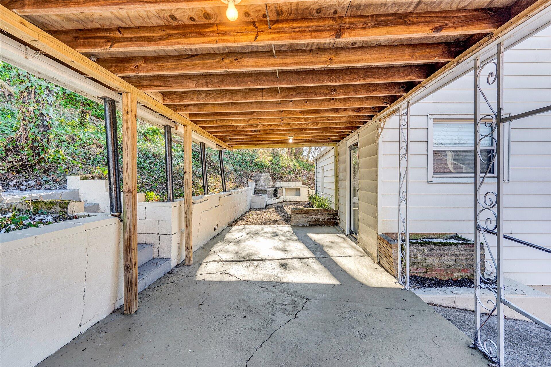 1329 Peters Creek Road Roanoke, VA 24017 - Photo 26 of 27 a view of a porch with wooden floor