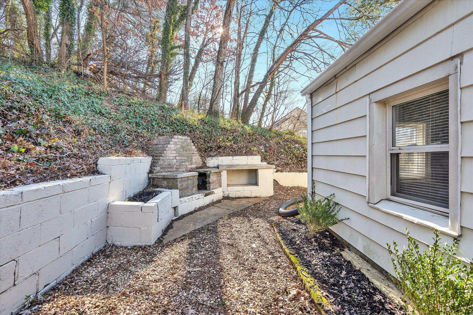 1329 Peters Creek Road Roanoke, VA 24017 - Photo 27 of 27 a front view of a house with garden