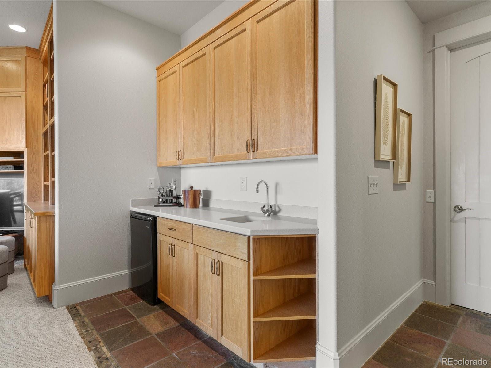 6264 Flagstaff Road Boulder, CO 80302 - Photo 11 of 50 a bathroom with a sink and a mirror