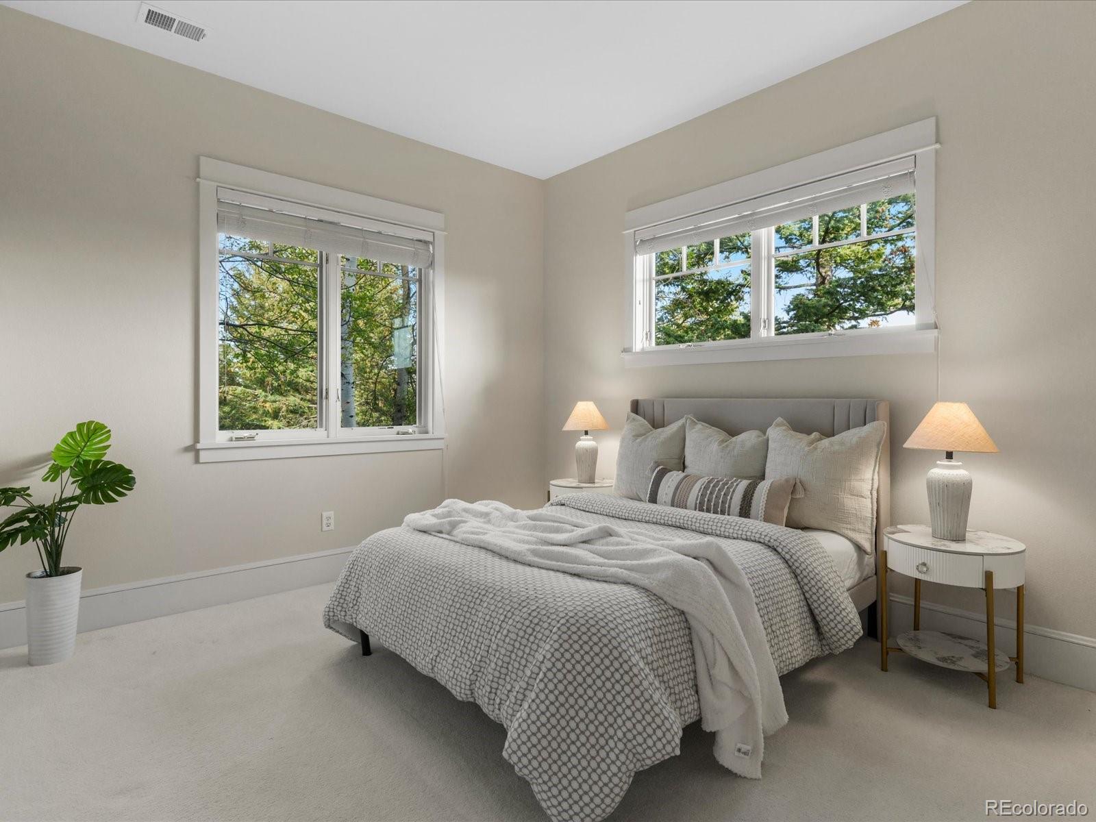 6264 Flagstaff Road Boulder, CO 80302 - Photo 13 of 50 a bedroom with a bed and a window