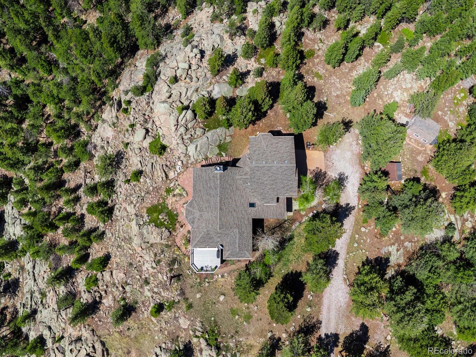 6264 Flagstaff Road Boulder, CO 80302 - Photo 4 of 50 an aerial view of a house with a yard