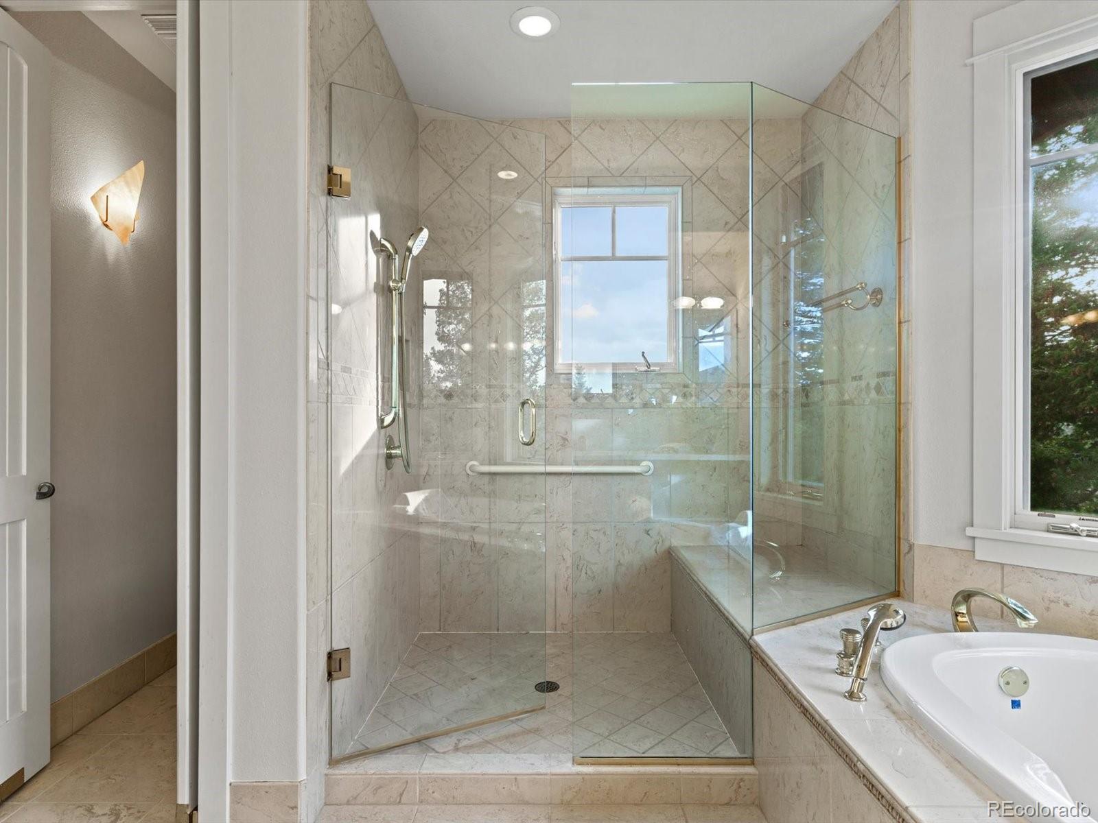 6264 Flagstaff Road Boulder, CO 80302 - Photo 42 of 50 a bathroom with a shower and a sink