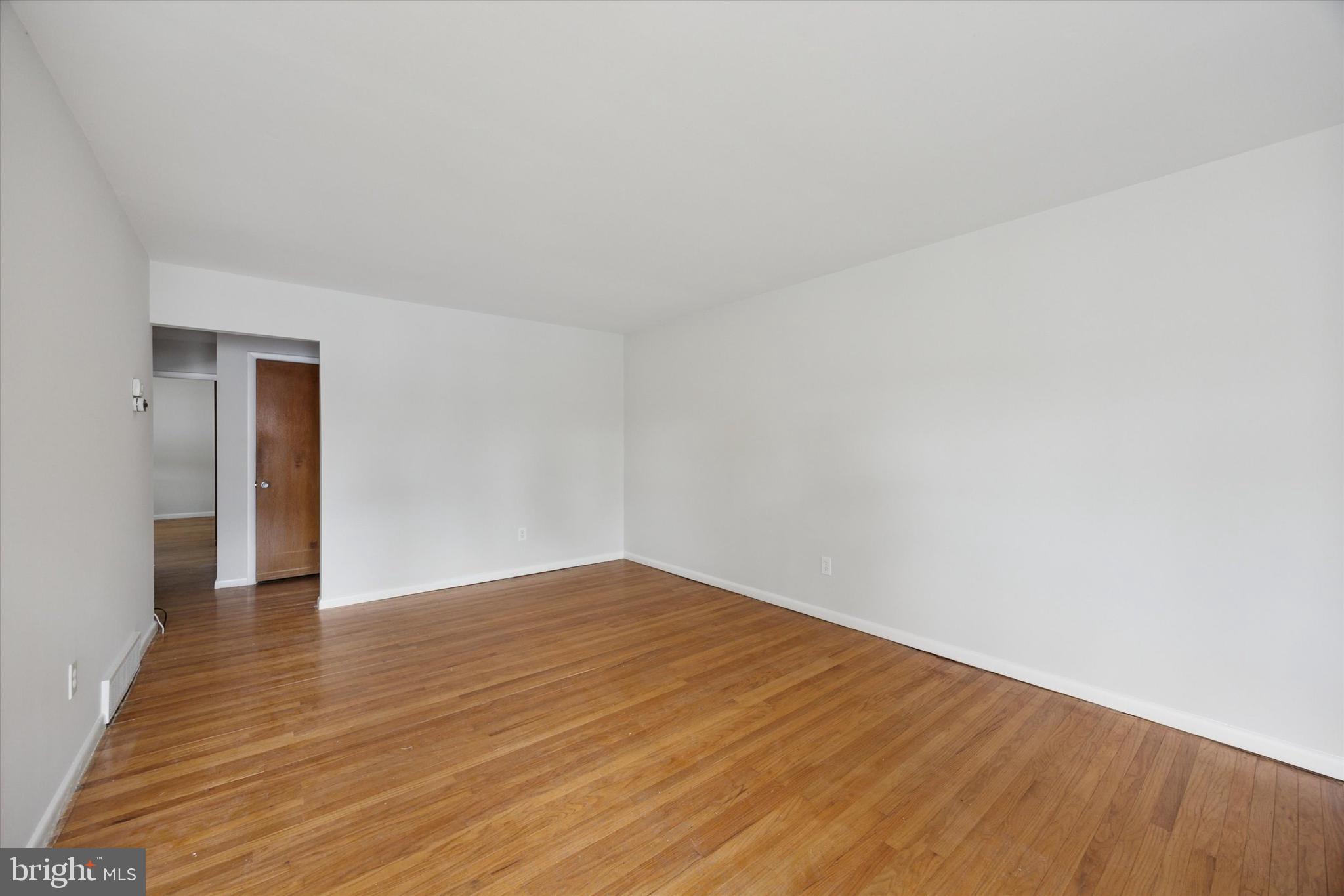 1069 Surrey Road Philadelphia, PA 19115 - Photo 26 of 27 a view of an empty room and wooden floor