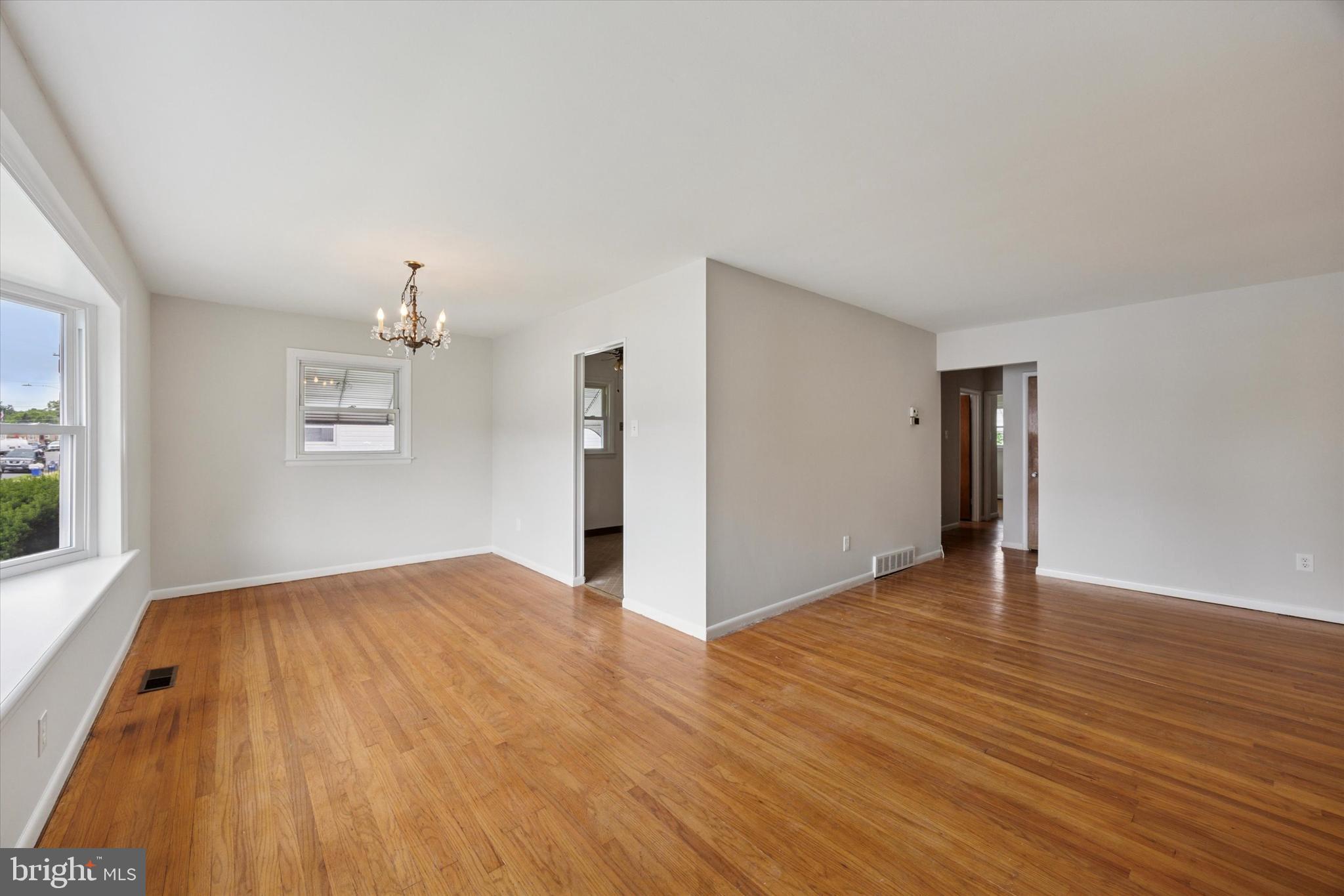 1069 Surrey Road Philadelphia, PA 19115 - Photo 6 of 27 a view of empty room with wooden floor