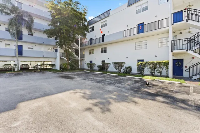 a view of a street with cars