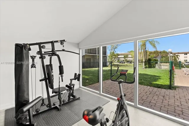 a view of a room with gym equipment