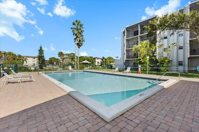 a view of outdoor space swimming pool and lake view