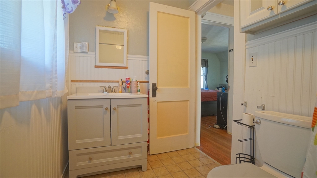 26 Harkness Avenue Springfield, MA 01118 - Photo 15 of 25 a bathroom with a sink toilet and shower