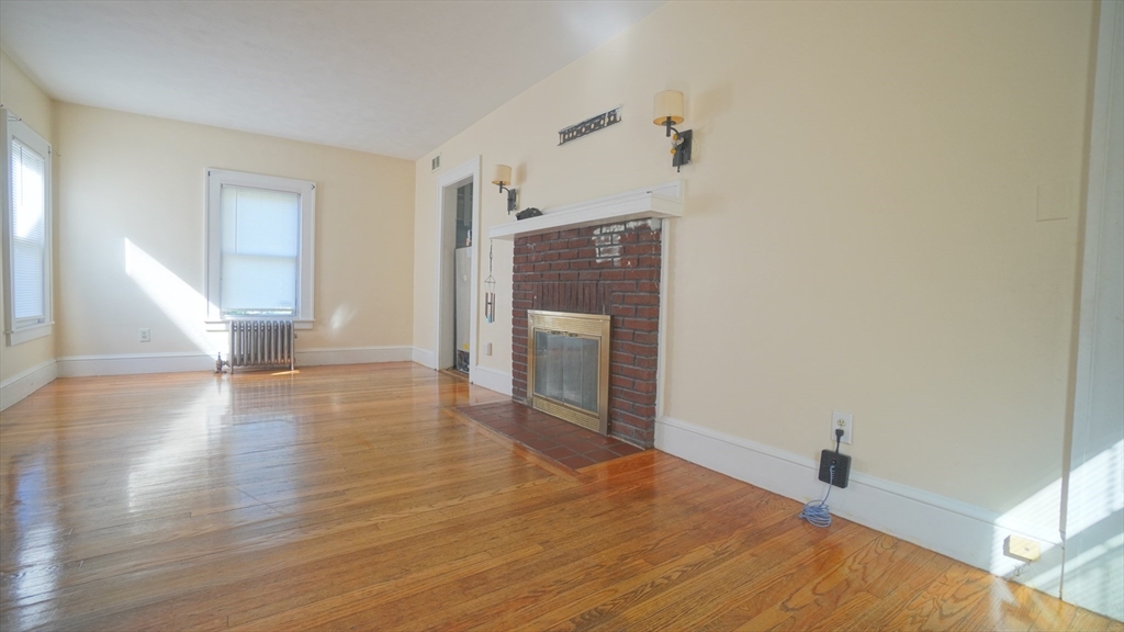 26 Harkness Avenue Springfield, MA 01118 - Photo 4 of 25 a view of empty room with wooden floor