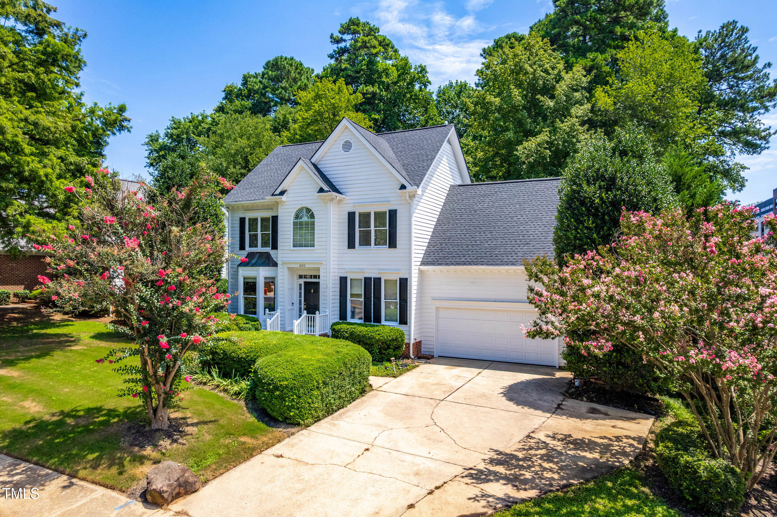 600 Hardimont Road Raleigh, NC 27609 - Photo 3 of 56 a front view of a house with a yard