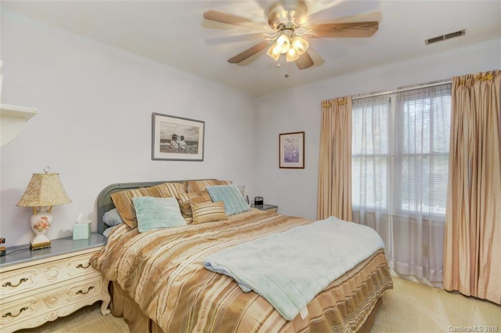 5204 Fowler Farm Road Mint Hill, NC 28227 - Photo 20 of 28 a bedroom with a bed and a window