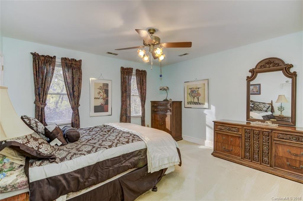 5204 Fowler Farm Road Mint Hill, NC 28227 - Photo 21 of 28 a bedroom with a bed and a dresser