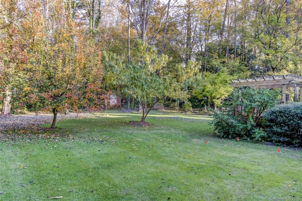 5204 Fowler Farm Road Mint Hill, NC 28227 - Photo 26 of 28 a view of a tree in the middle of a yard