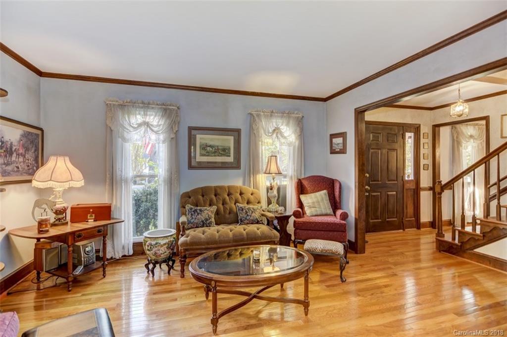 5204 Fowler Farm Road Mint Hill, NC 28227 - Photo 6 of 28 a living room with furniture and a lamp