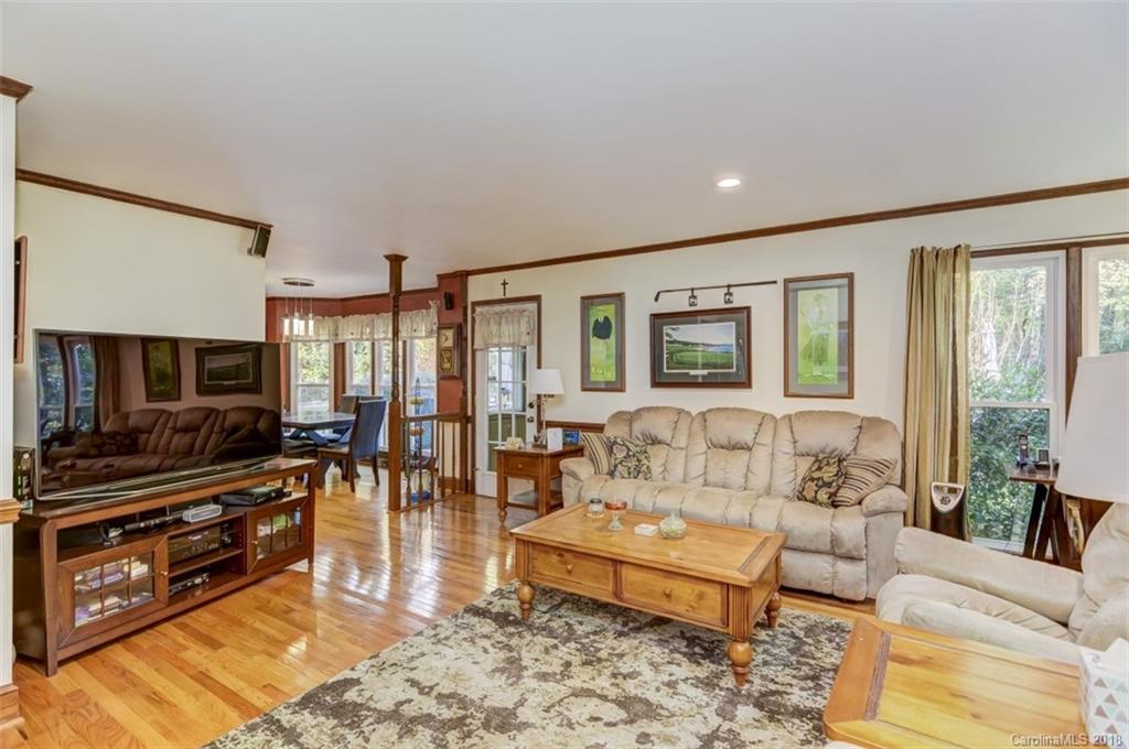 5204 Fowler Farm Road Mint Hill, NC 28227 - Photo 7 of 28 a living room with furniture and a flat screen tv