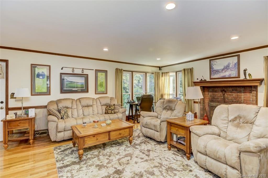 5204 Fowler Farm Road Mint Hill, NC 28227 - Photo 8 of 28 a living room with furniture and a fireplace