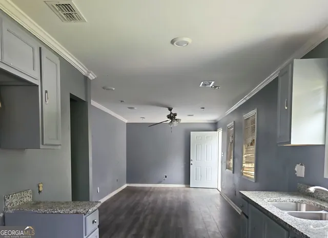 a view of a kitchen cabinets a sink and dishwasher