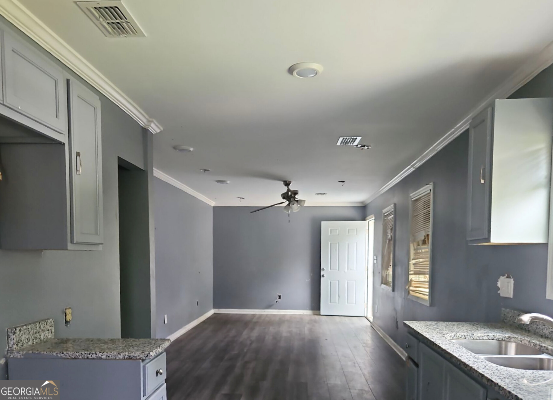 117 Dahlia Avenue Northwest Atlanta, GA 30314 - Photo 6 of 10 a view of a kitchen cabinets a sink and dishwasher