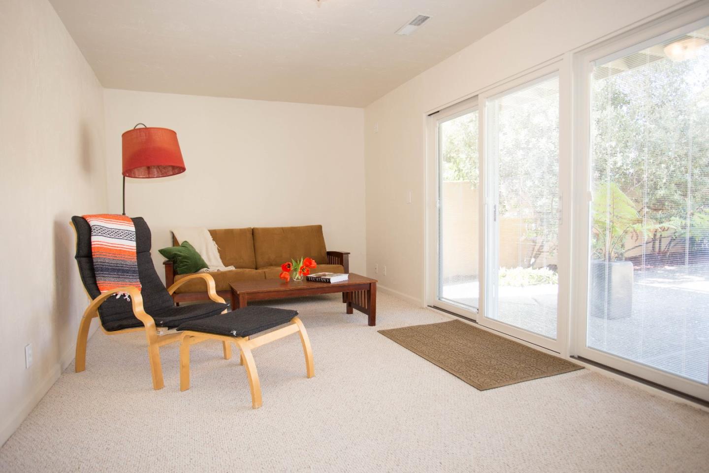 6 Pio Pico Way Pacifica, CA 94044 - Photo 7 of 17 a living room with furniture and a floor to ceiling window