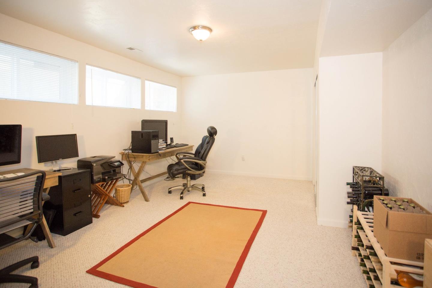 6 Pio Pico Way Pacifica, CA 94044 - Photo 8 of 17 a room with gym equipment and a flat screen tv