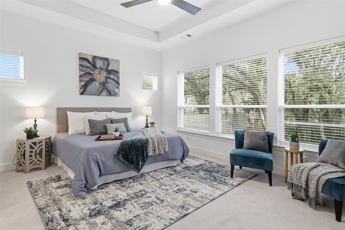 209 Springhouse Road Georgetown, TX 78628 - Photo 16 of 31 The serene primary suite features peaceful views