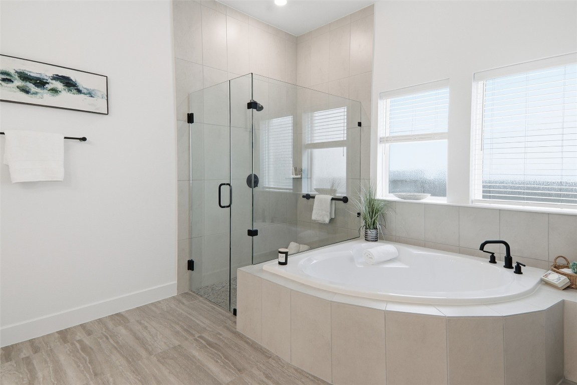 209 Springhouse Road Georgetown, TX 78628 - Photo 19 of 31 Soak in the tub or enjoy the spacious walk-in shower.