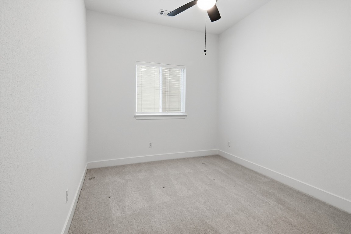 209 Springhouse Road Georgetown, TX 78628 - Photo 26 of 31 Guest bedroom number 4.