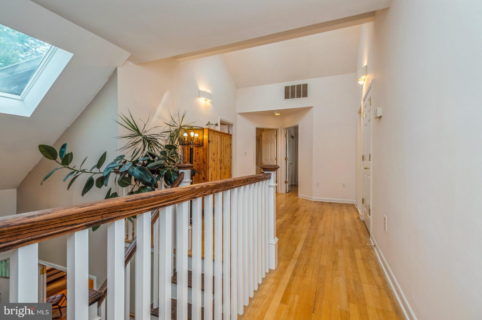 536 Rosedale Road Princeton, NJ 08540 - Photo 16 of 34 a view of a hallway with wooden floor and stairs