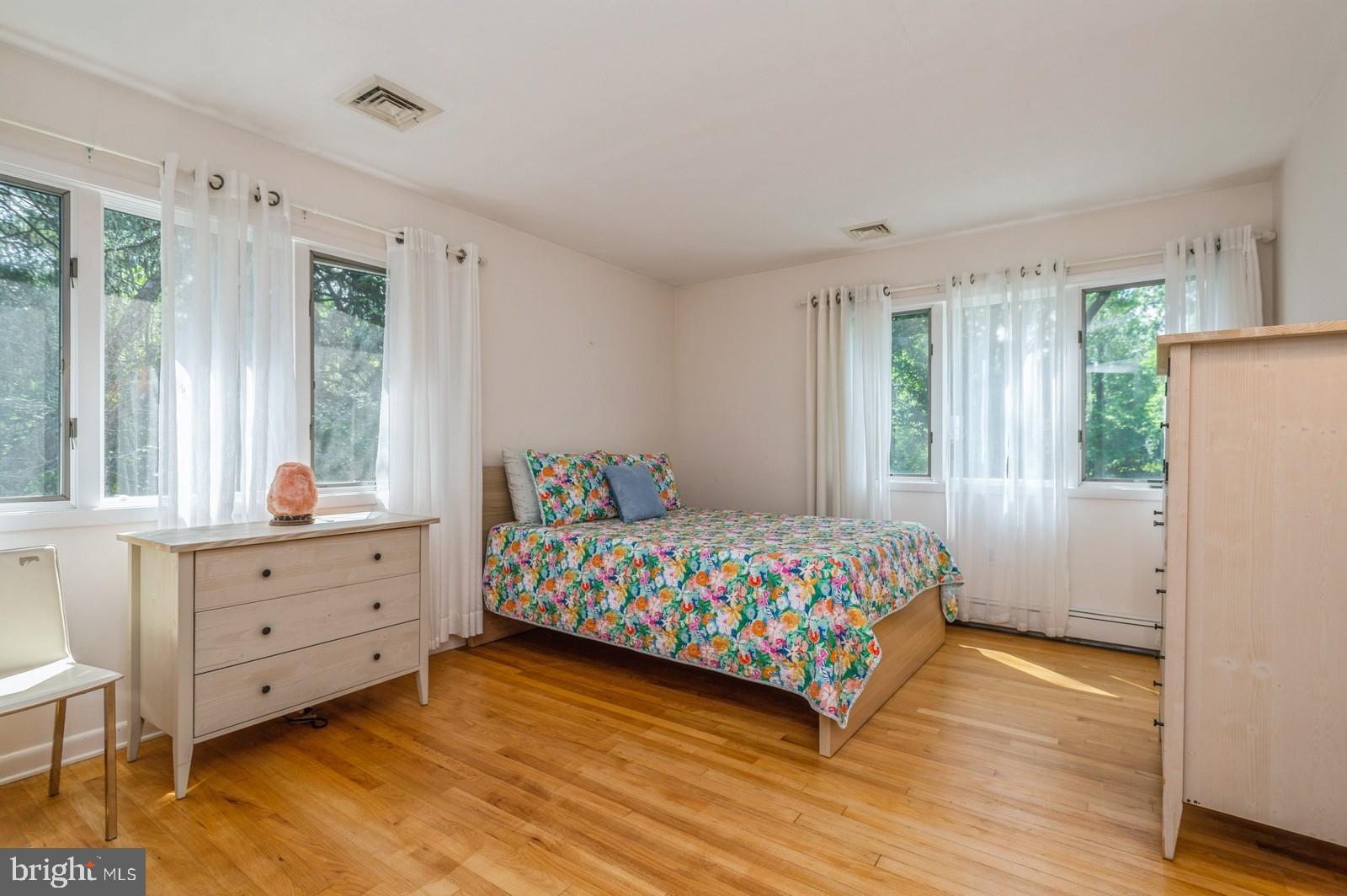 536 Rosedale Road Princeton, NJ 08540 - Photo 21 of 34 a bedroom with a bed and a dresser