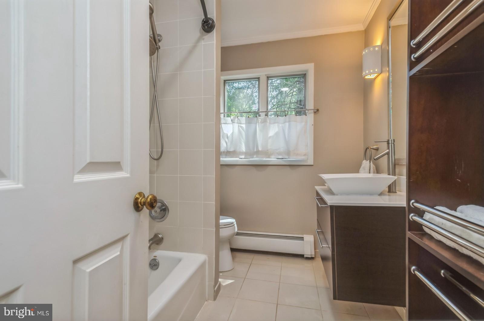 536 Rosedale Road Princeton, NJ 08540 - Photo 26 of 34 a bathroom with a sink toilet and tub