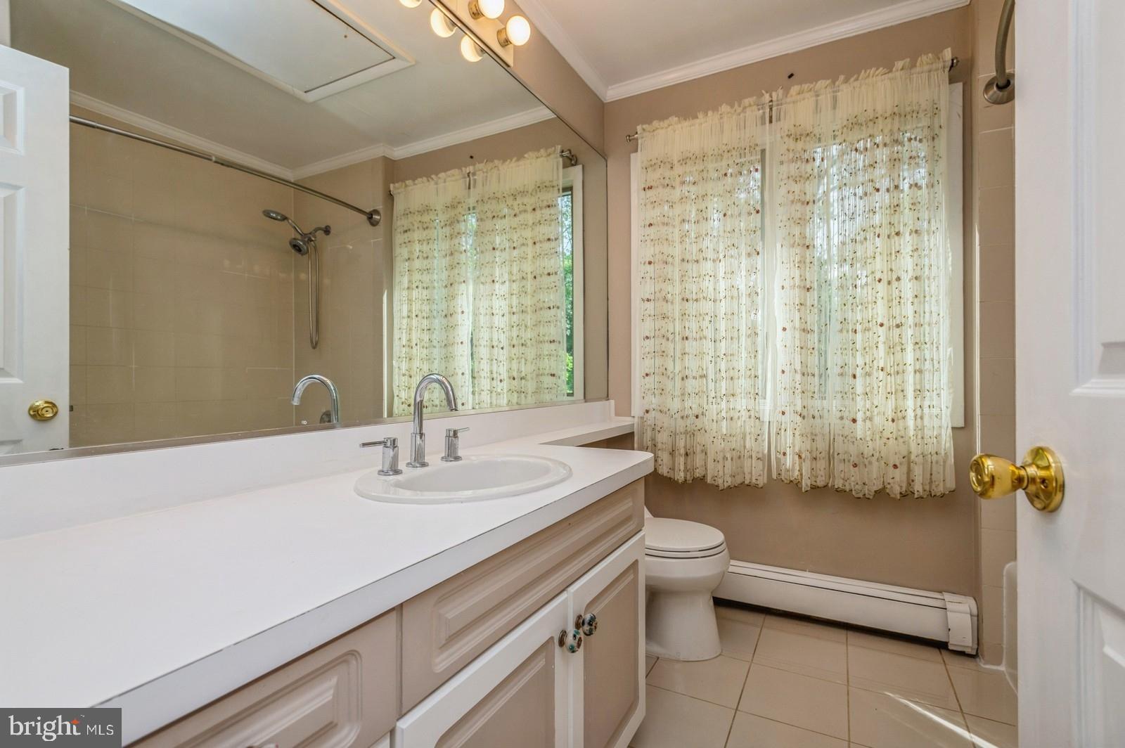 536 Rosedale Road Princeton, NJ 08540 - Photo 27 of 34 a bathroom with a sink a toilet and a bathtub