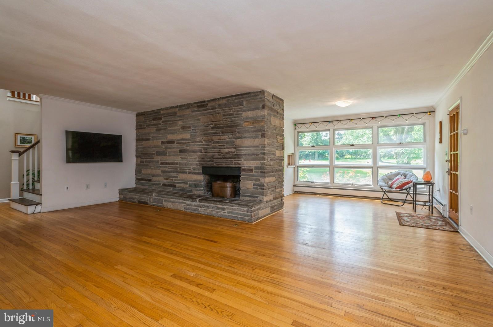 536 Rosedale Road Princeton, NJ 08540 - Photo 5 of 34 a living room with fireplace furniture and a flat screen tv