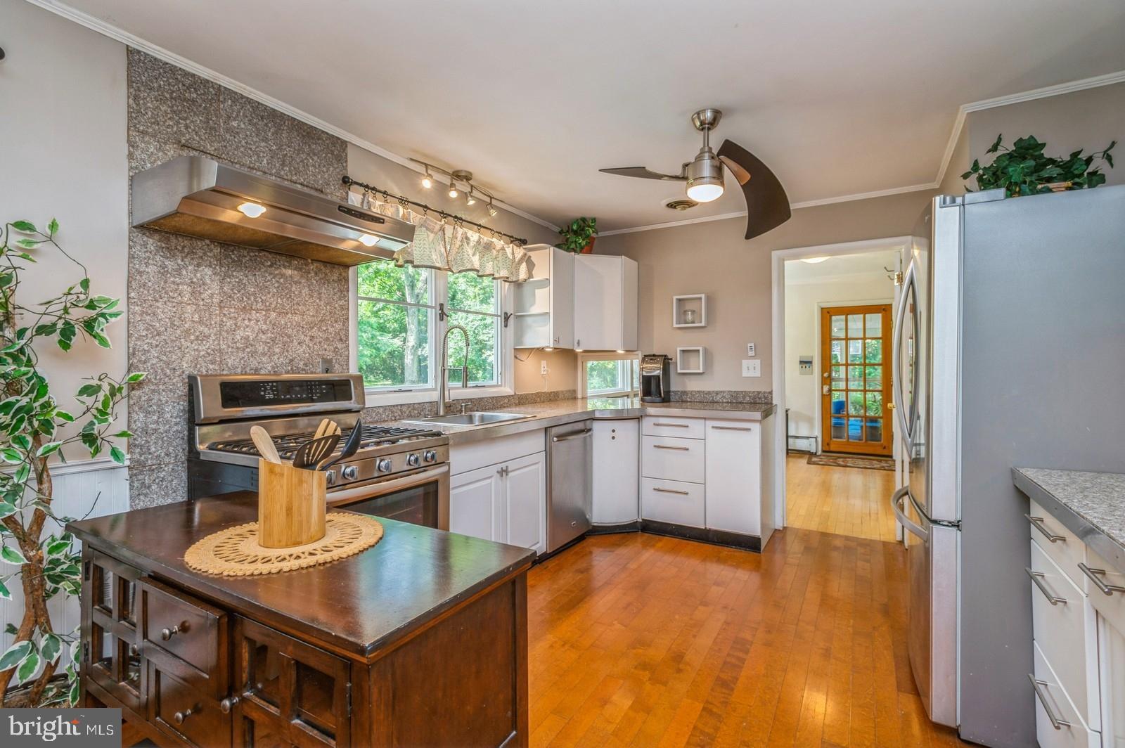 536 Rosedale Road Princeton, NJ 08540 - Photo 8 of 34 a kitchen with stainless steel appliances granite countertop a sink stove and refrigerator