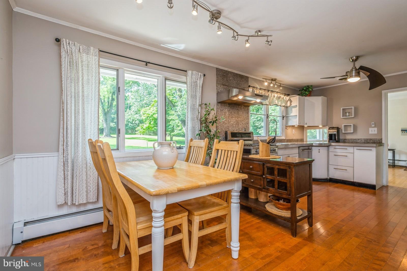 536 Rosedale Road Princeton, NJ 08540 - Photo 10 of 34 a open dining room with stainless steel appliances kitchen island granite countertop furniture and a kitchen view