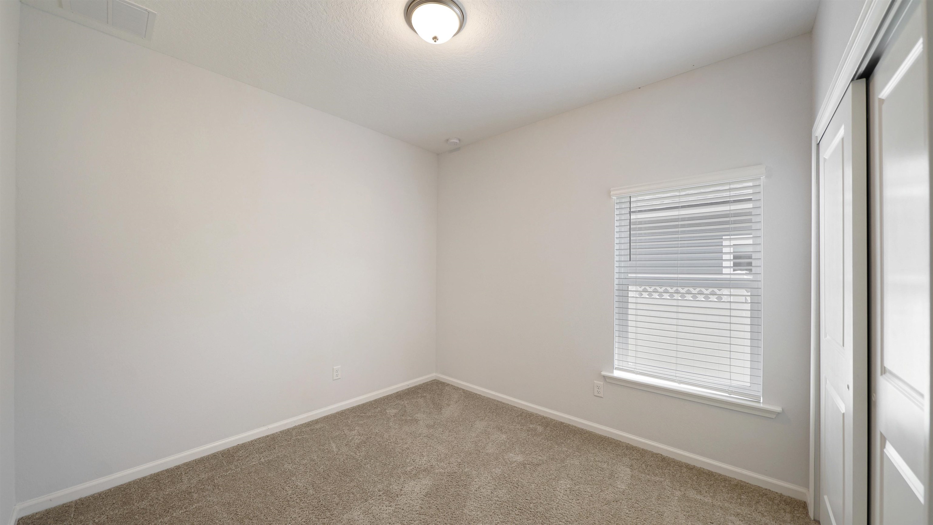 443 Watervale Drive St. Augustine, FL 32092 - Photo 23 of 39 a view of an empty room with a window