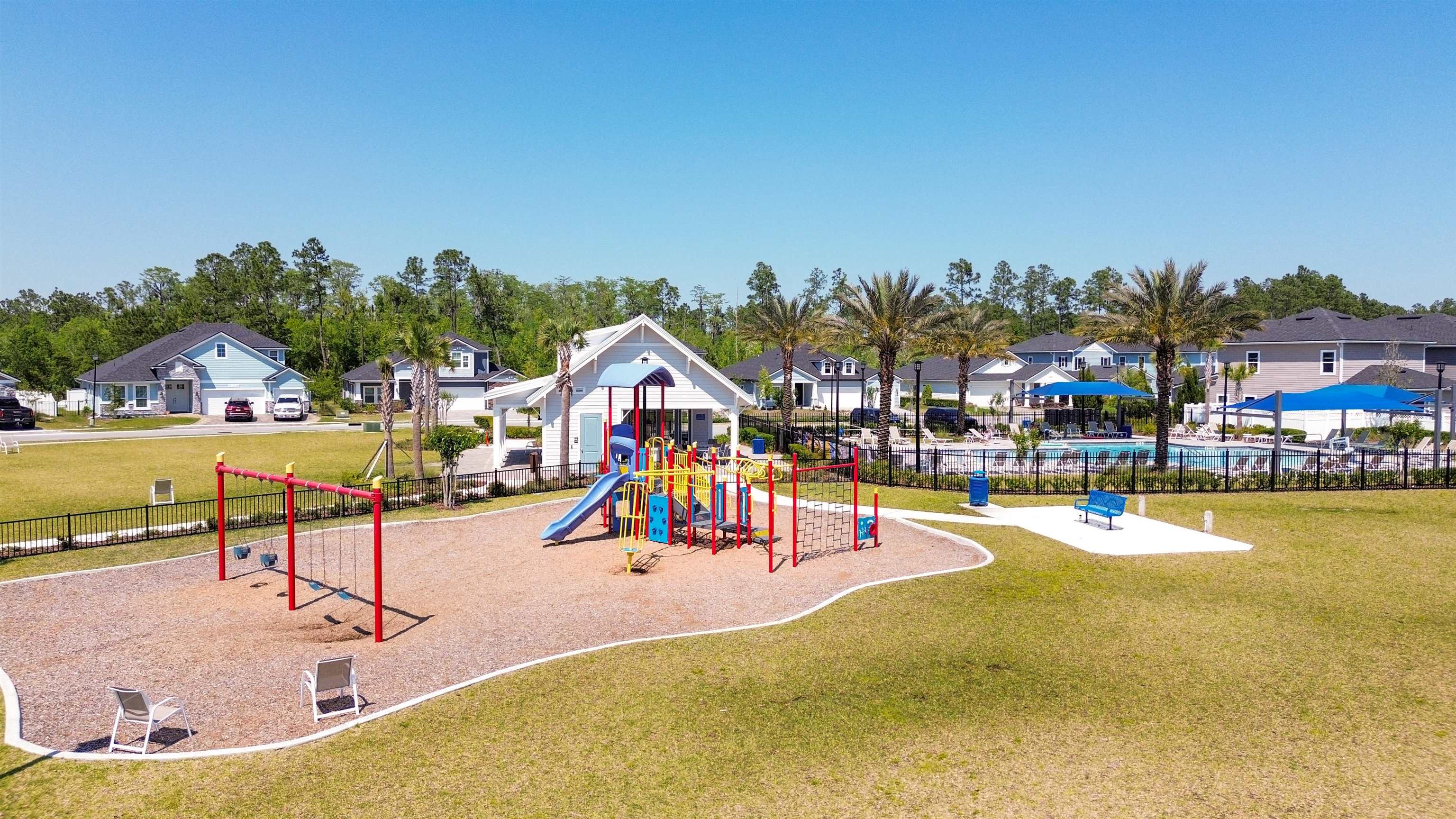 443 Watervale Drive St. Augustine, FL 32092 - Photo 34 of 39 a view of a swimming pool with a table and chairs