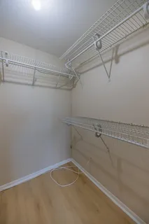 a view of a room with racks on the wall