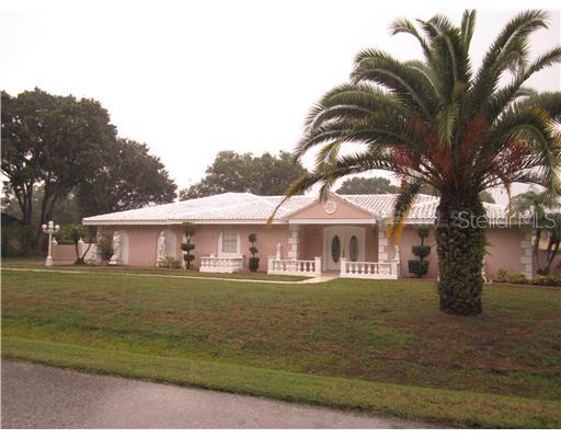 7607 Barry Road Tampa, FL 33615 - Photo 1 of 1 Exterior Front