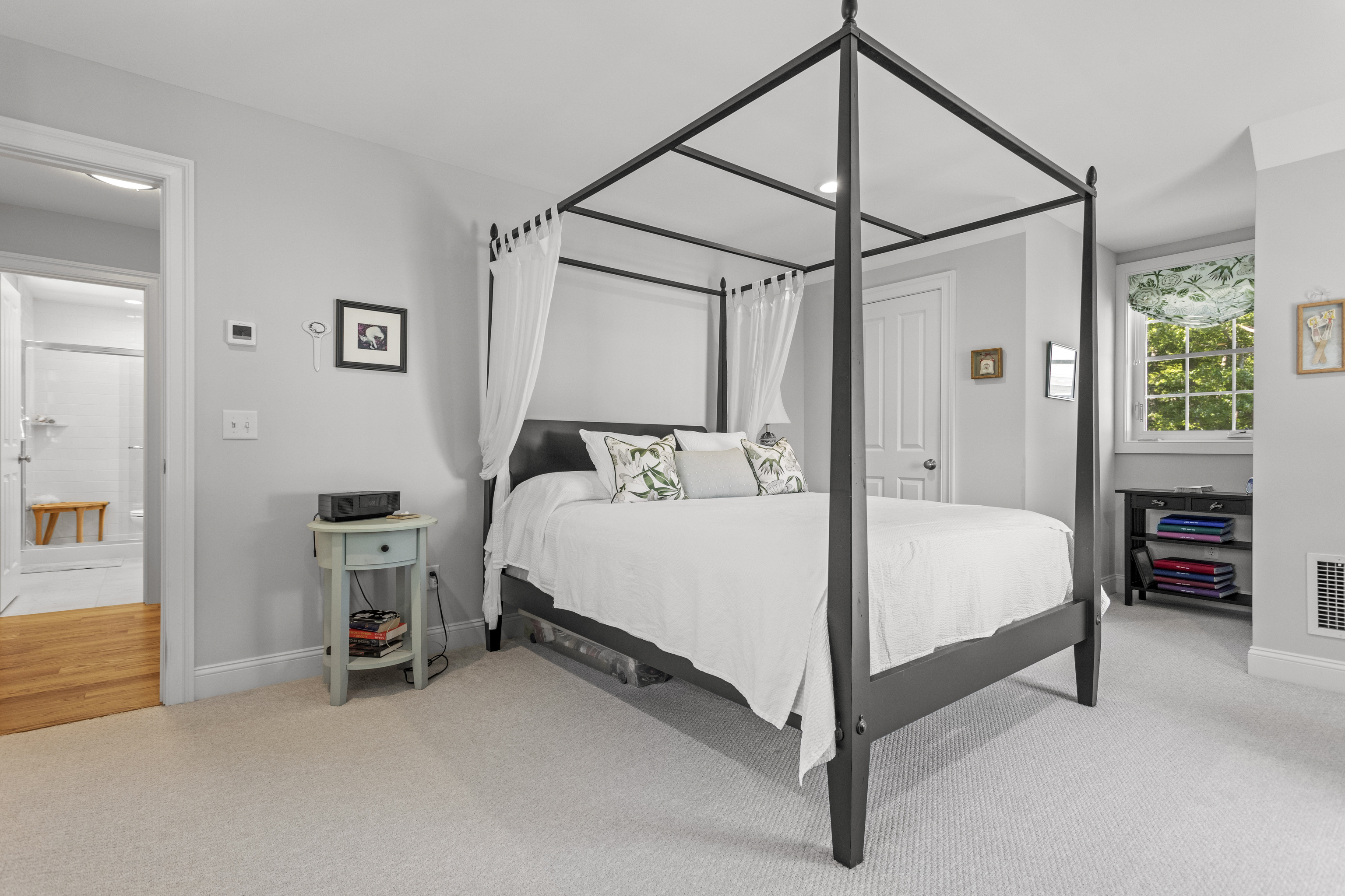 951 Old Clinton Road, Unit 15 Westbrook, CT 06498 - Photo 16 of 30 a bed room with a bed and a chair