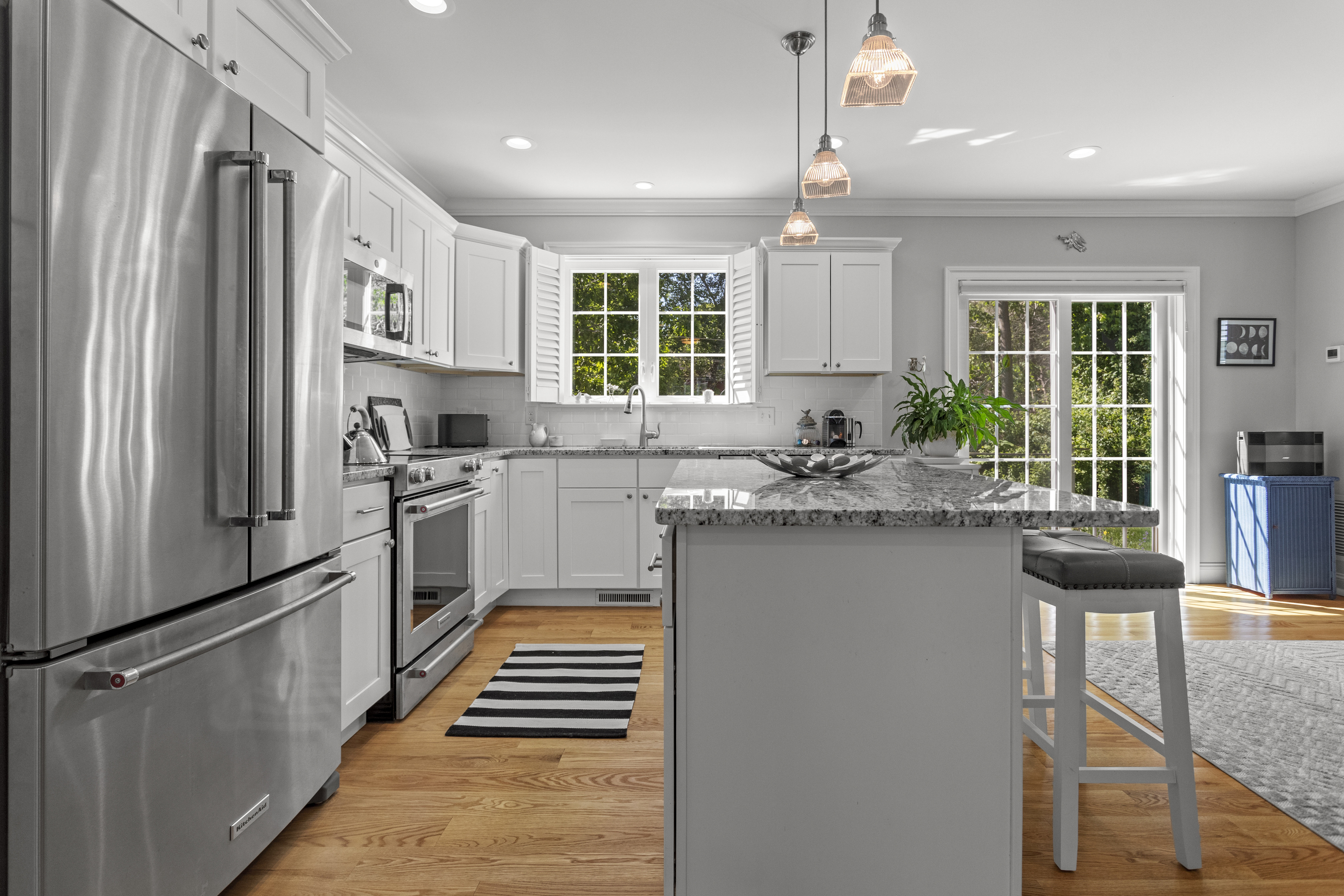 951 Old Clinton Road, Unit 15 Westbrook, CT 06498 - Photo 7 of 30 a kitchen with stainless steel appliances a refrigerator sink and cabinets