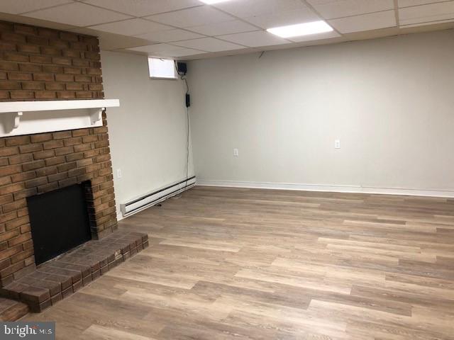 102 West Broad Street, Unit 1 Souderton, PA 18964 - Photo 16 of 20 a view of an empty room with a fireplace