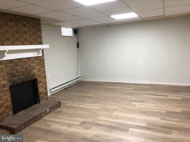 102 West Broad Street, Unit 1 Souderton, PA 18964 - Photo 18 of 20 a view of empty room with fireplace