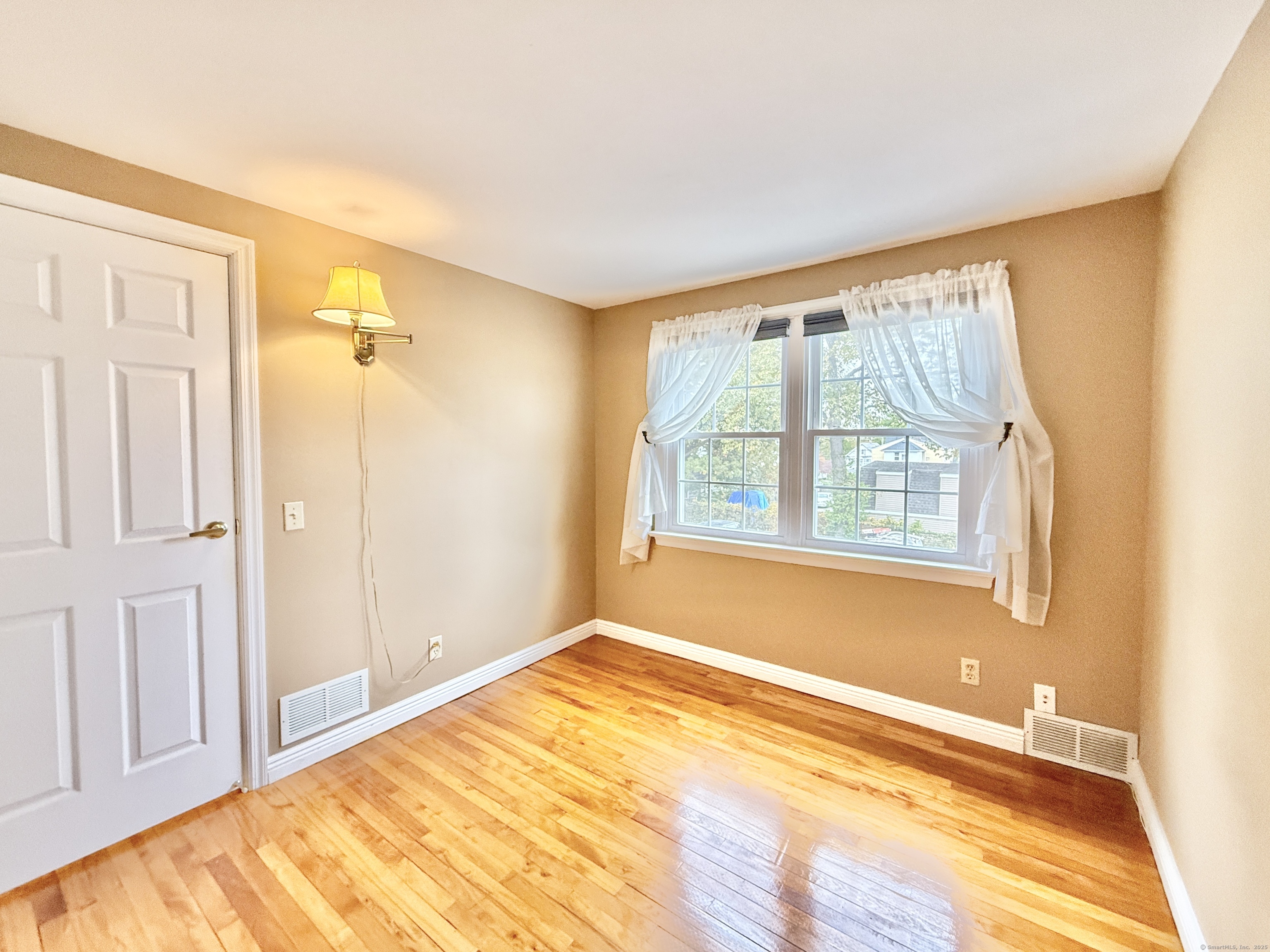 171 Sylvan Knoll Road Stamford, CT 06902 - Photo 12 of 23 a view of an empty room with a window