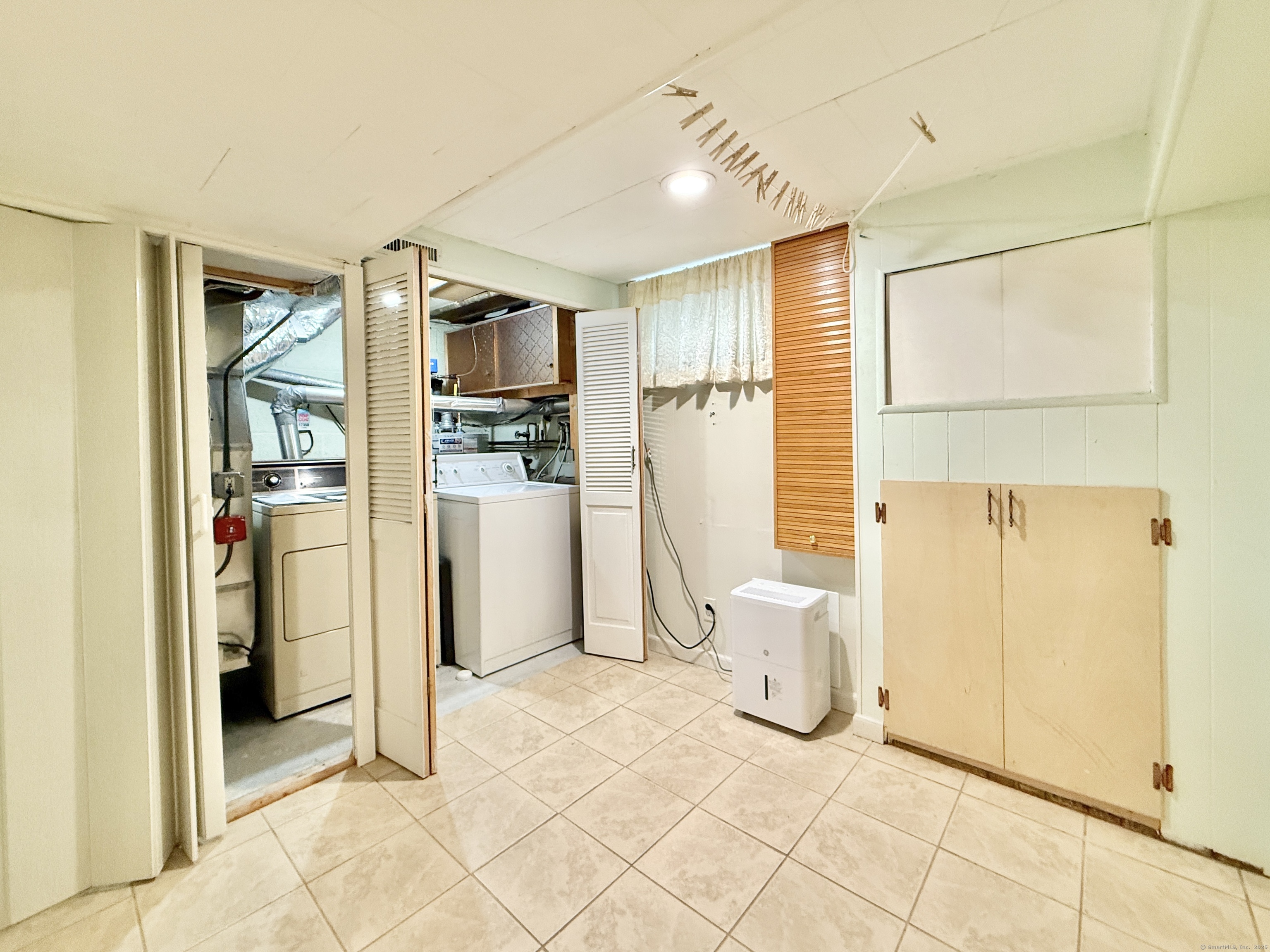 171 Sylvan Knoll Road Stamford, CT 06902 - Photo 19 of 23 a view of a storage & utility room