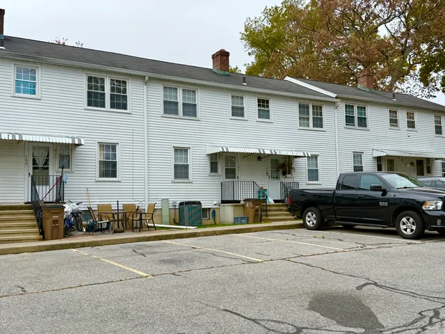 a car parked in front of a house