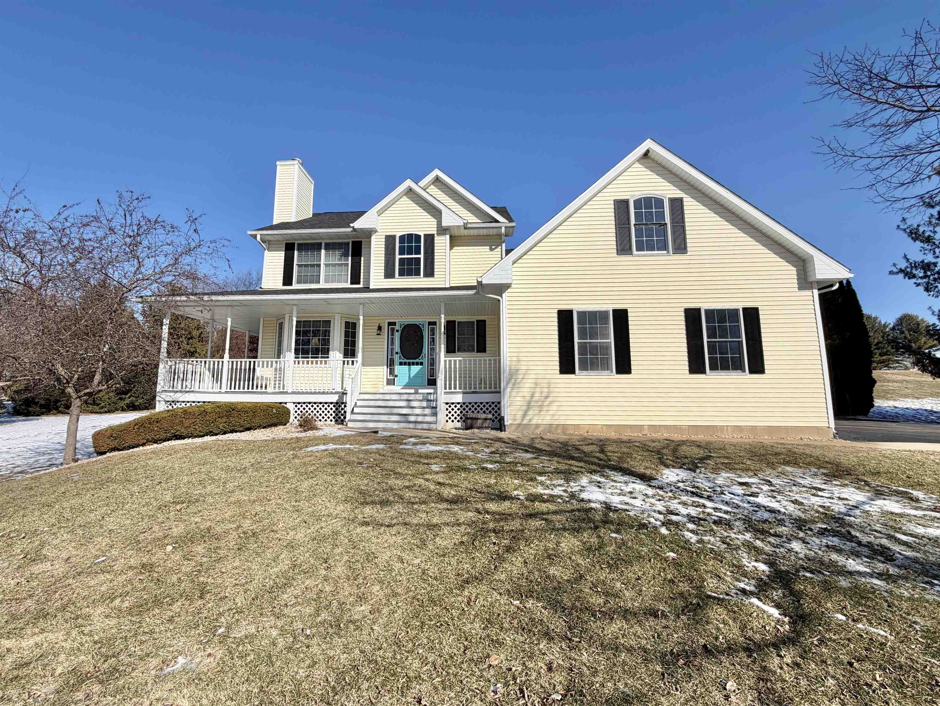 5206 East Hubbard Trail Byron, IL 61010 - Photo 3 of 52 a front view of a house with a yard