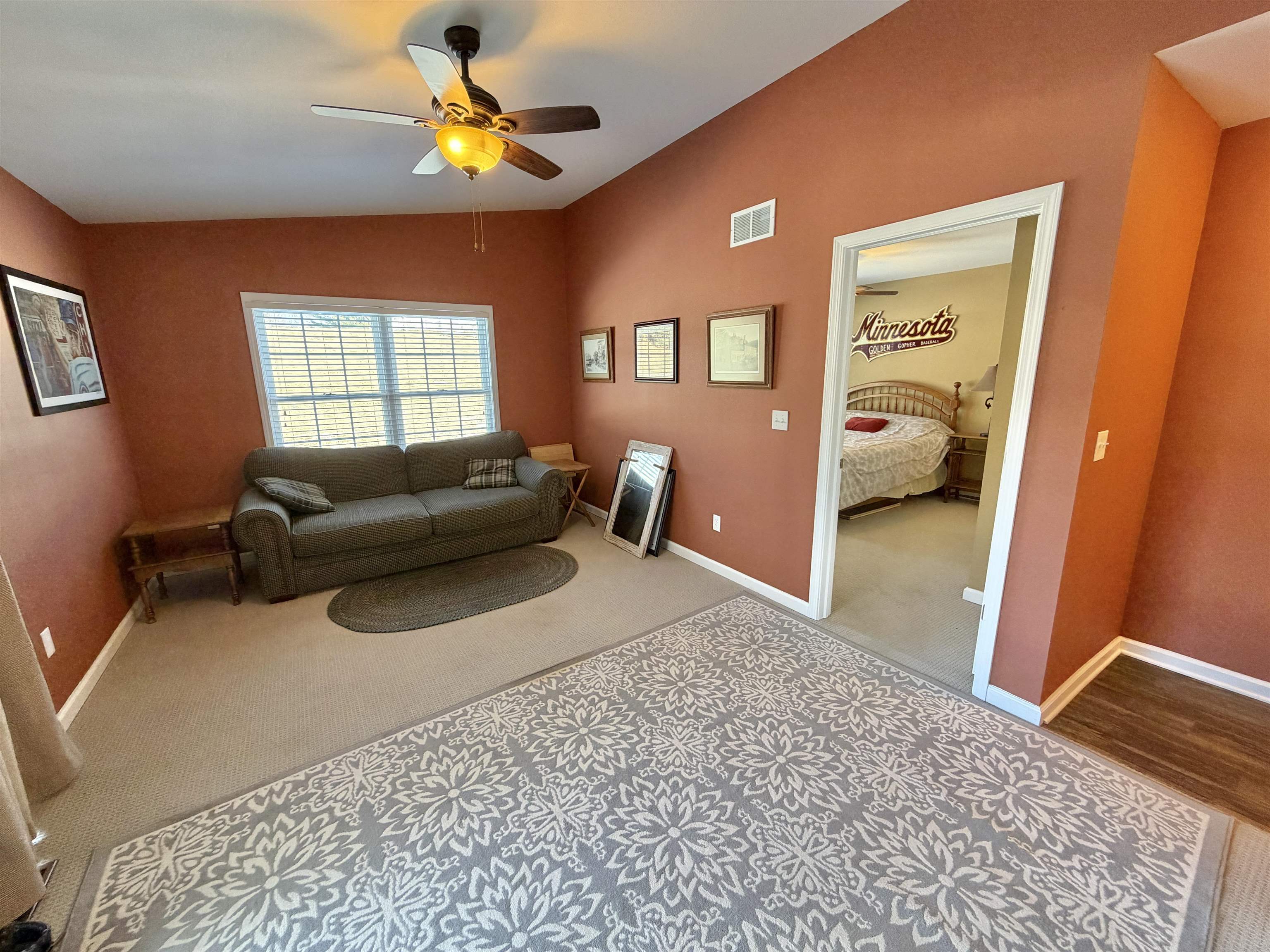 5206 East Hubbard Trail Byron, IL 61010 - Photo 37 of 52 a living room with furniture and a window