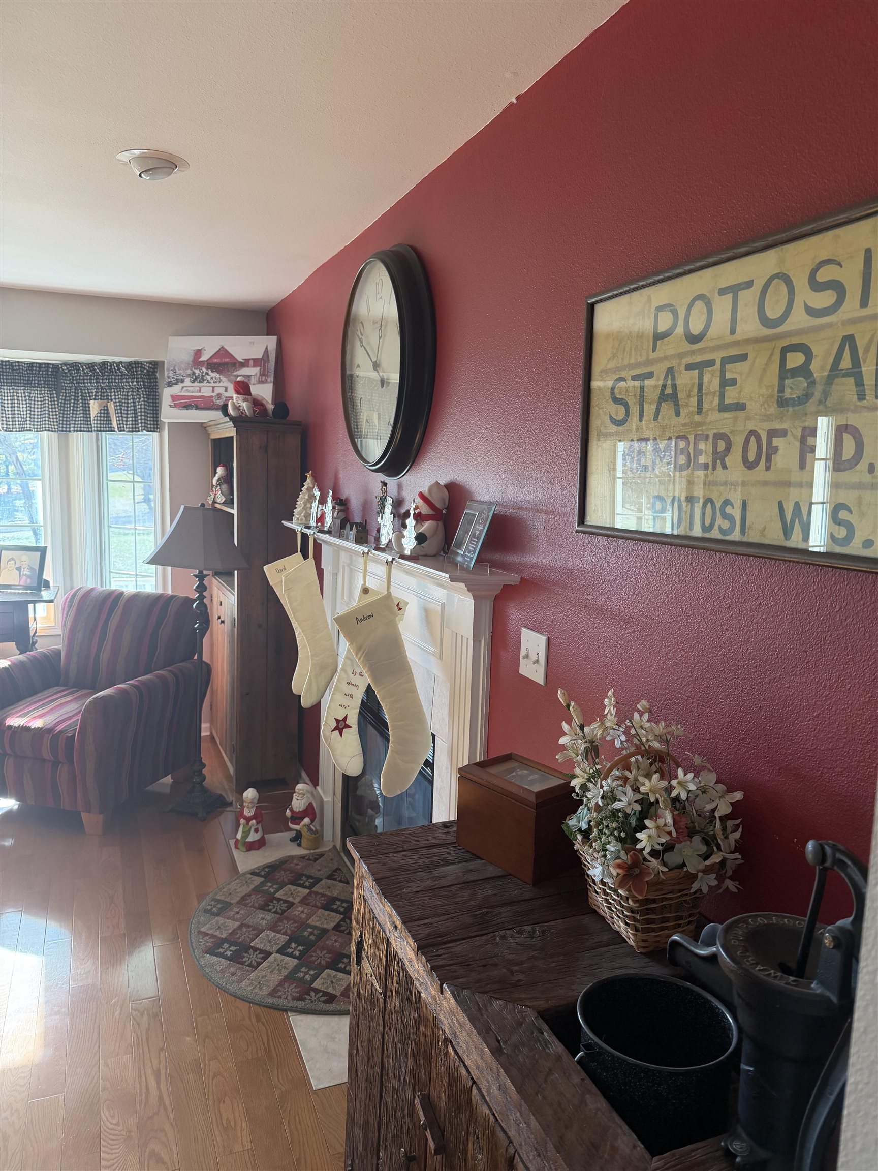 5206 East Hubbard Trail Byron, IL 61010 - Photo 9 of 52 a living room with furniture and a chandelier