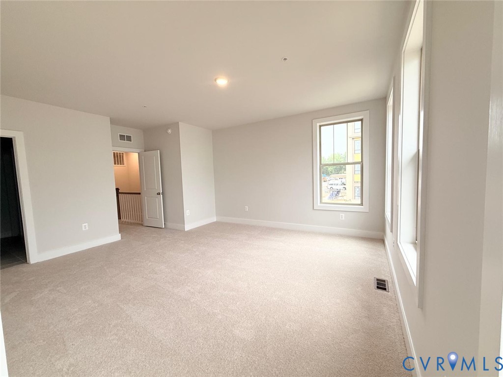 3628 Edna Path, Unit A Henrico, VA 23231 - Photo 3 of 7 Spacious room with plush carpeting, neutral wall f