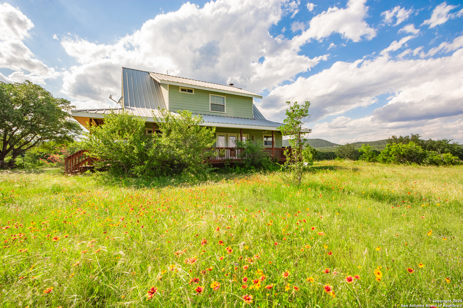 2925 County Road 361 Utopia, TX 78884 - Photo 16 of 35 a view of swimming pool with garden